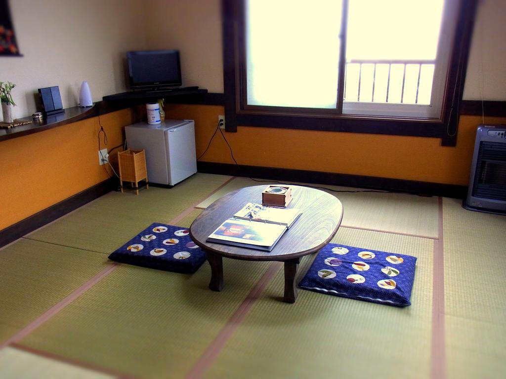 Nagomi No Yado Iida Hotel Shakotan Quarto foto